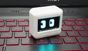 The compact desk buddy - a small ESP32-C3 powered robot with an OLED screen