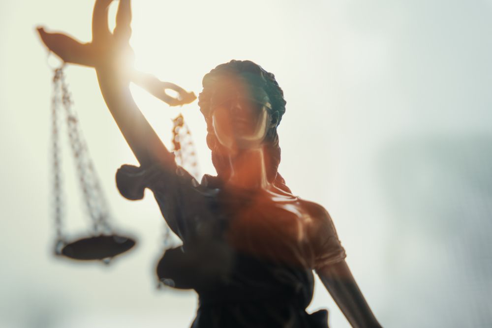 A photo collage symbolizing the "scales of justice."